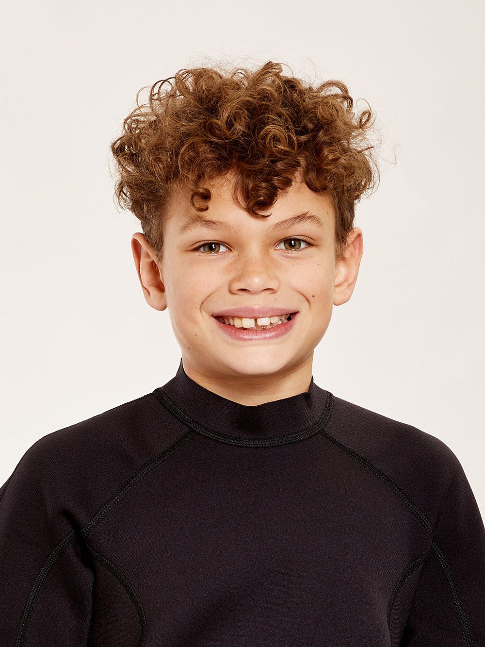 Boy with short curly hair